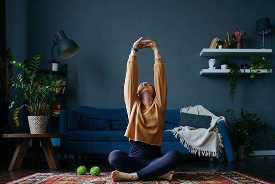 women stretching Family Caregivers blog cover